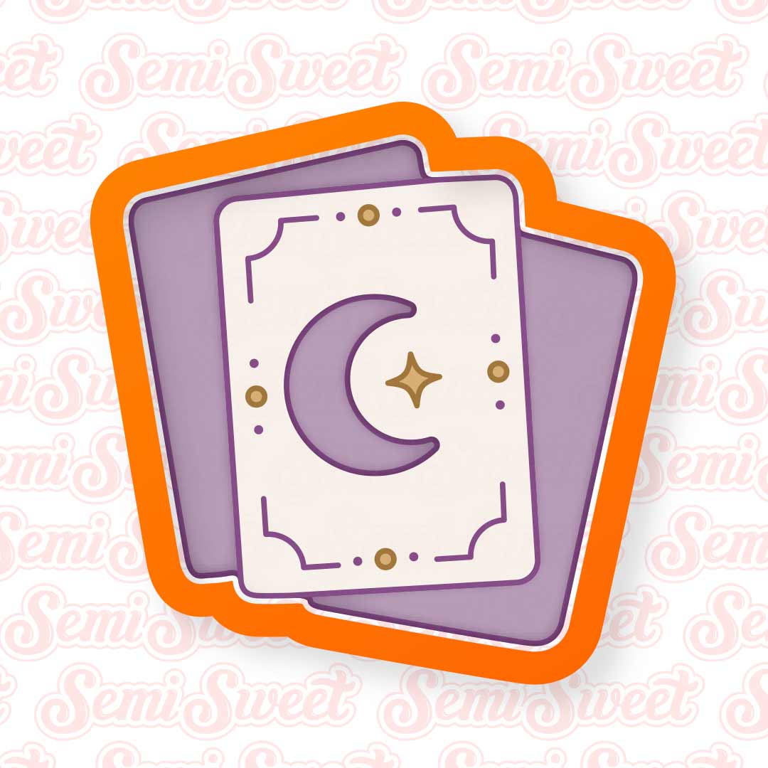 a cookie cutter design of a stack of tarot cards. This is part of a mystic Halloween cookie cutter set.